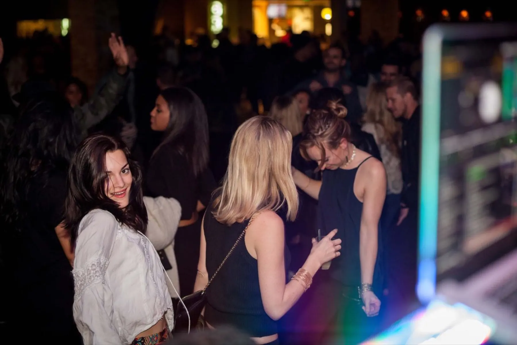 Guests dancing at Gold Spike at night